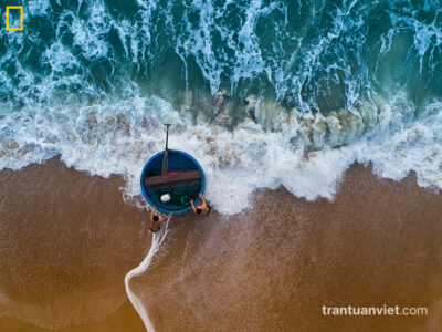 Corale boat near the wave, Vietnam