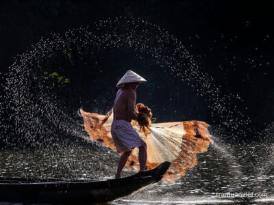 Fisherman casts the net