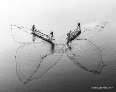 Fishermen throwing net in Hue, Vietnam fine-art photo print