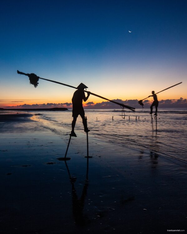 Vietnamese Stilt Fishermen